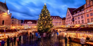 Europe’s Christmas markets warily open as Covid cases rise