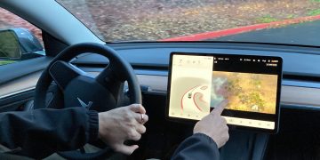 Tesla disables gaming while driving feature
