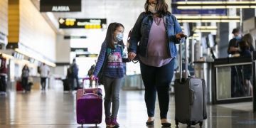 How can you travel safely reducing the risk of COVID infection?