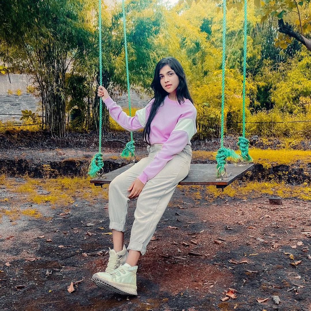 Prachi Kadam on a swing