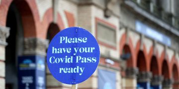 Covid isolation time halved by US health agency