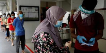 Covid vaccination mandatory in Singapore from February 2022