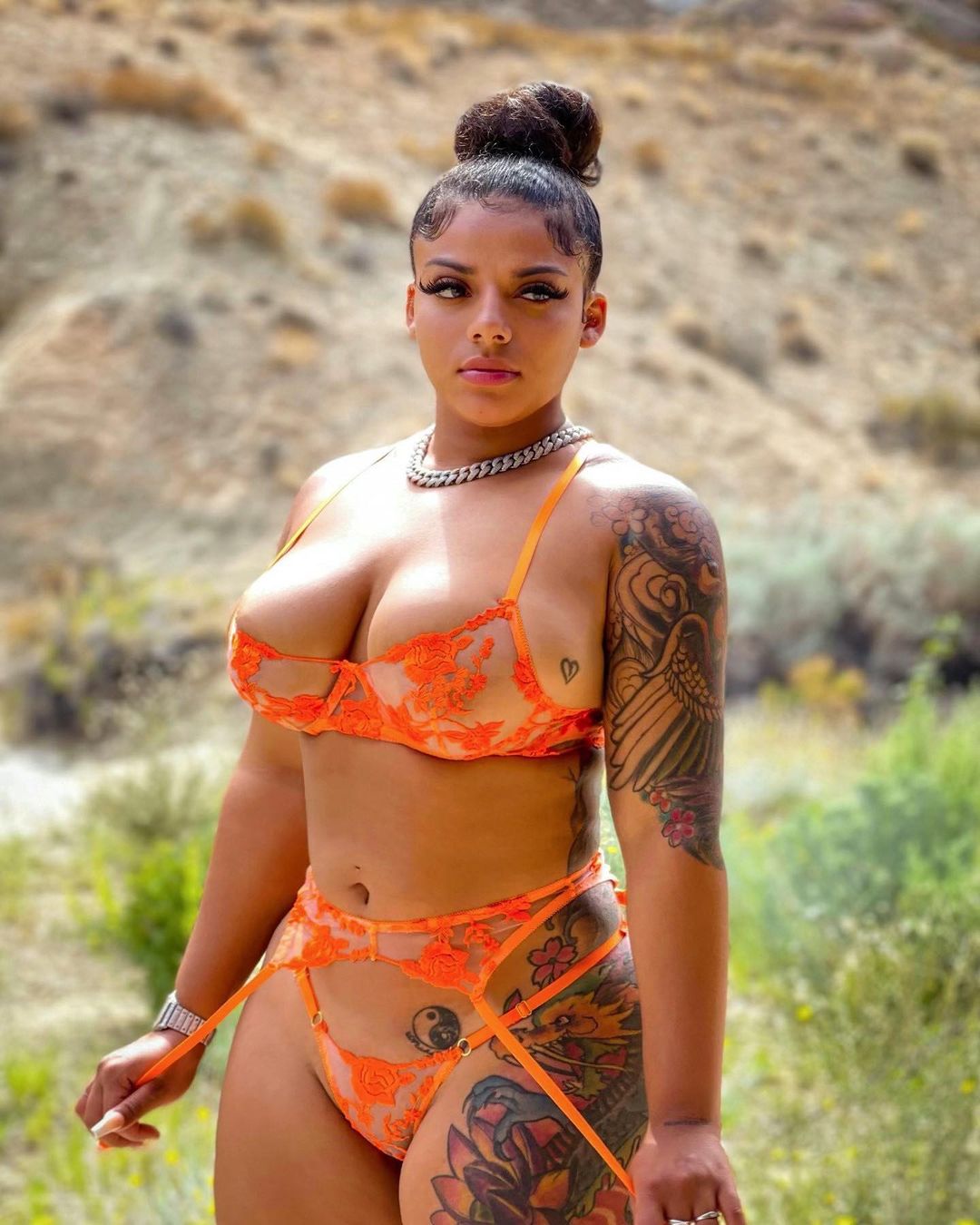Mikayla Saravia in orange bikini