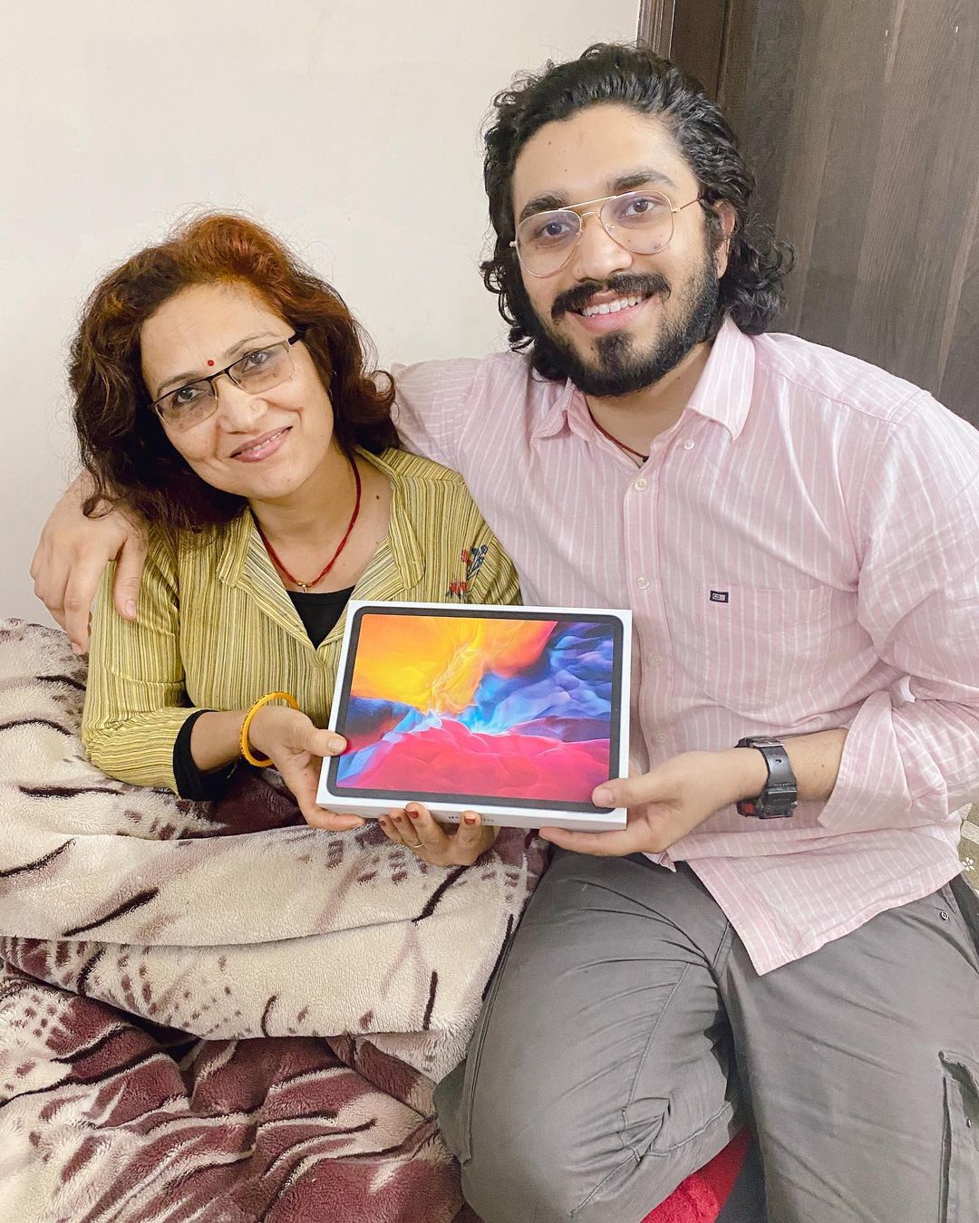 Aman Dhattarwal with his mom