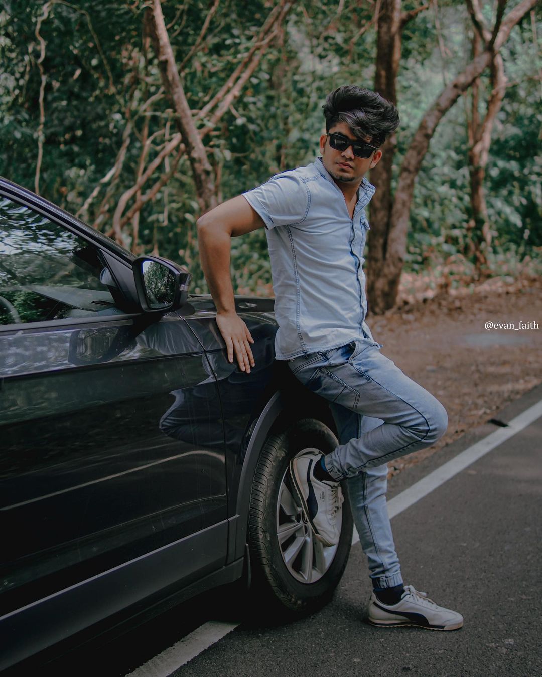 Steeve Joseph posing with car