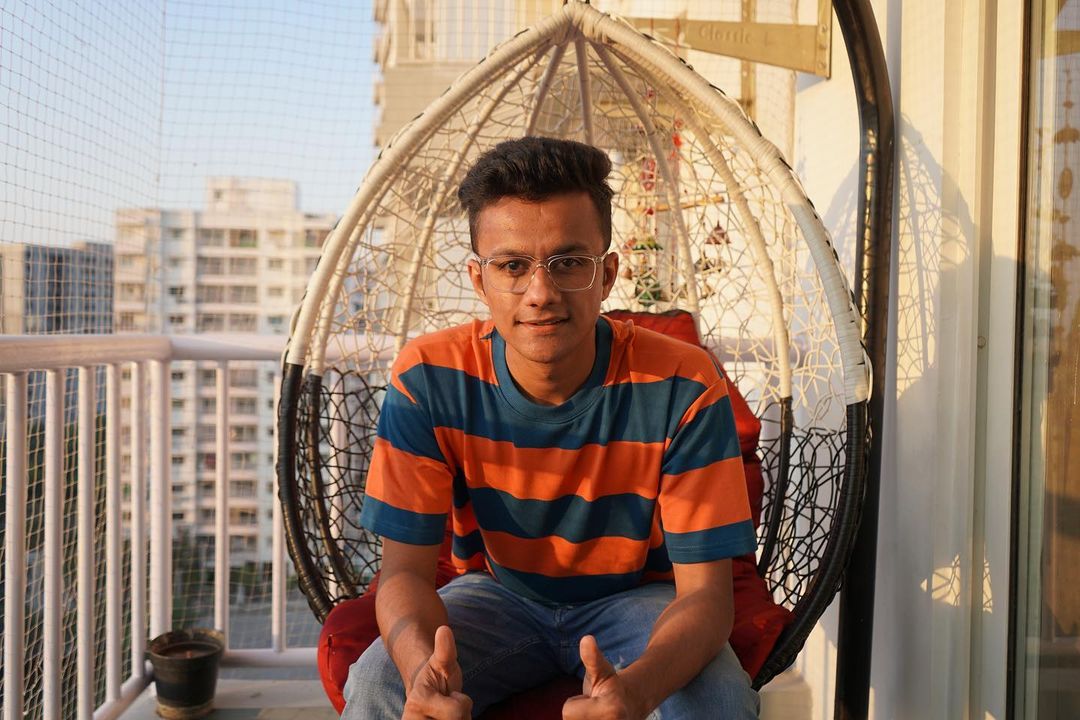 Prafull Billore sitting on a swing