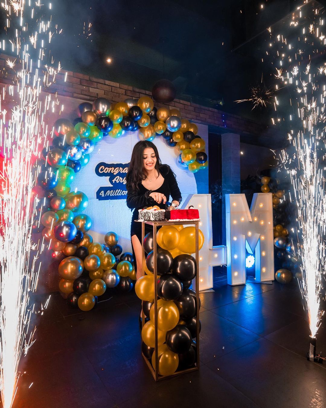 Aryanshi Sharma cutting cake