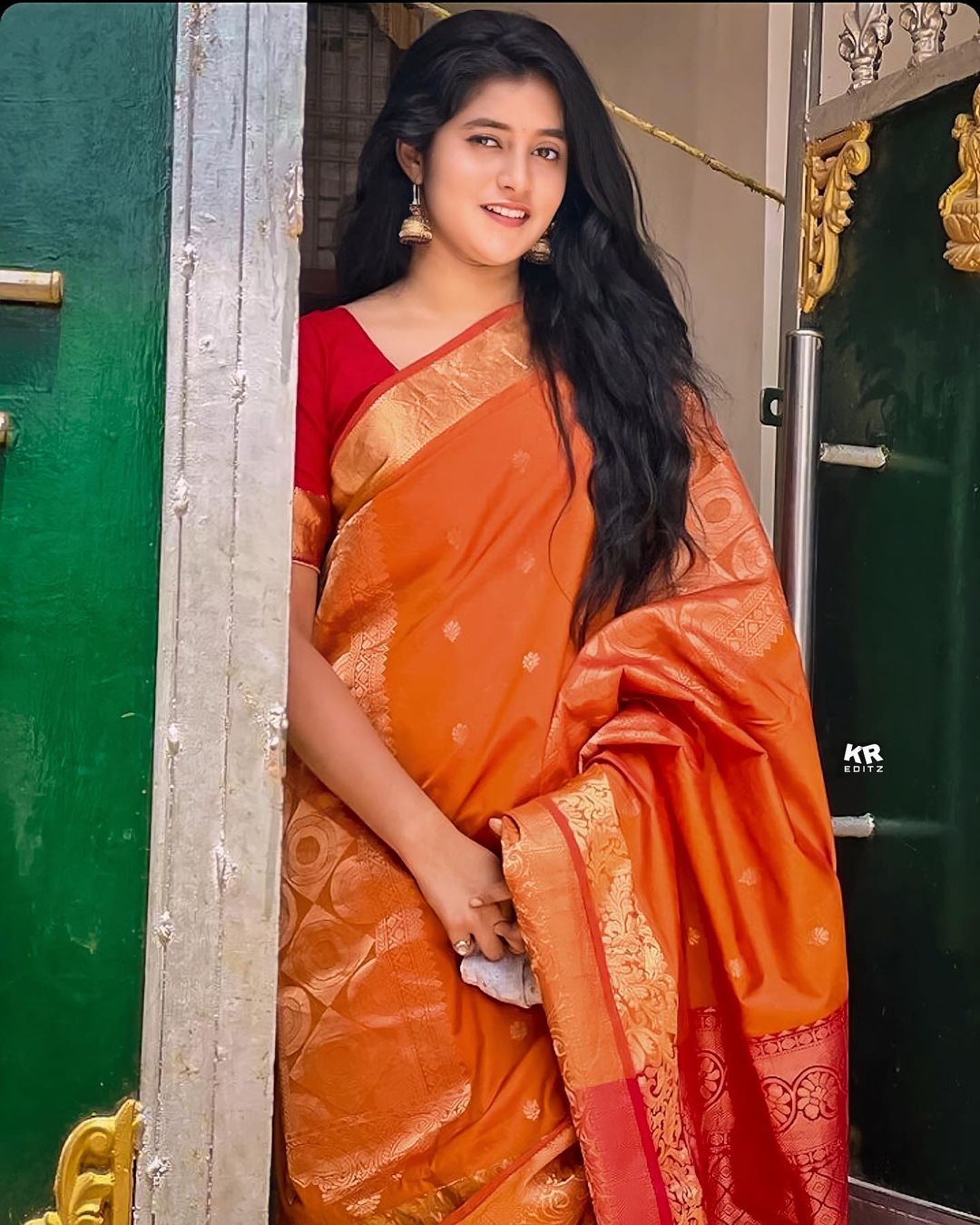 Sanchita Bashu in orange saree